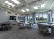 Community lounge with multiple seating areas and a view at 5904 Wake Forest Run # 102, Bradenton, FL 34211
