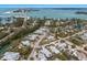 Aerial view of canal-front homes and neighborhood at 600 Fox St, Longboat Key, FL 34228