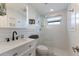 Clean bathroom, featuring a walk-in shower and modern vanity at 600 Fox St, Longboat Key, FL 34228