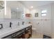 Bathroom with a double vanity and updated fixtures at 600 Fox St, Longboat Key, FL 34228