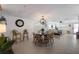 Open concept dining area with unique lighting fixture at 600 Fox St, Longboat Key, FL 34228