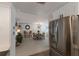 Bright kitchen with stainless steel appliances and white shaker cabinets at 600 Fox St, Longboat Key, FL 34228
