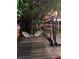 Cozy backyard patio with seating and string lights at 600 Fox St, Longboat Key, FL 34228