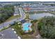 Aerial view showcasing home location near pool and lake at 6111 Fairmont Ln, Palmetto, FL 34221