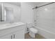 Clean bathroom with white vanity, tub, and toilet at 6111 Fairmont Ln, Palmetto, FL 34221