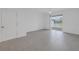 Spacious bedroom with tile floors and sliding glass doors leading to a patio at 6111 Fairmont Ln, Palmetto, FL 34221