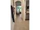 Bright and airy entryway with tile floors and view to living room at 6111 Fairmont Ln, Palmetto, FL 34221