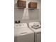 Laundry room with washer, dryer and shelving at 6111 Fairmont Ln, Palmetto, FL 34221