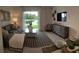 Open concept living area with sectional sofa and patio access at 6111 Fairmont Ln, Palmetto, FL 34221
