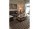 Spacious living room with sectional sofa and a view to patio at 6111 Fairmont Ln, Palmetto, FL 34221
