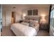 Spacious main bedroom with plush bedding and ample light at 6111 Fairmont Ln, Palmetto, FL 34221