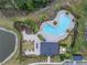 Community pool with surrounding lounge chairs and landscaping at 6111 Fairmont Ln, Palmetto, FL 34221