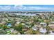 Aerial view showcasing the home's location in a residential area near the water at 6231 Beechwood Ave, Sarasota, FL 34231