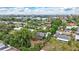 Aerial view of property and surrounding neighborhood, showcasing waterfront access at 6231 Beechwood Ave, Sarasota, FL 34231