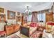 Sophisticated bedroom with antique furnishings and rich textiles at 6231 Beechwood Ave, Sarasota, FL 34231