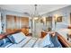Elegant bedroom with antique furniture and a chandelier at 6231 Beechwood Ave, Sarasota, FL 34231