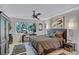 Comfortable bedroom with large windows and a relaxing atmosphere at 6231 Beechwood Ave, Sarasota, FL 34231