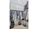 Well-organized closet with hanging rods and shelving units at 6231 Beechwood Ave, Sarasota, FL 34231