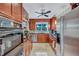 Bright kitchen with stainless steel appliances and ample counter space at 6231 Beechwood Ave, Sarasota, FL 34231