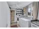 Convenient laundry room with washer, dryer, and ample storage at 6231 Beechwood Ave, Sarasota, FL 34231