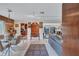 Open living space with stylish furniture and a view of the kitchen at 6231 Beechwood Ave, Sarasota, FL 34231