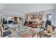 Spacious living area featuring comfortable seating and large windows at 6231 Beechwood Ave, Sarasota, FL 34231