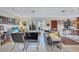 Comfortable living room with gray sofas and large windows at 6231 Beechwood Ave, Sarasota, FL 34231