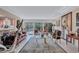 Open living space with access to the pool and lush landscaping at 6231 Beechwood Ave, Sarasota, FL 34231
