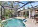 Enjoy this private screened pool and patio oasis at 6231 Beechwood Ave, Sarasota, FL 34231