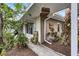 Home's side exterior showcasing walkway and landscaping at 6231 Beechwood Ave, Sarasota, FL 34231