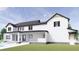 Two-story farmhouse with attached garage and large backyard at 639 Oakford Rd, Sarasota, FL 34240