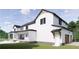 Two-story farmhouse with attached garage, pool, and large backyard at 639 Oakford Rd, Sarasota, FL 34240