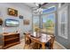 Kitchen breakfast nook with table and chairs, overlooking a backyard view at 6411 41St E Ct, Sarasota, FL 34243