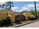 Watercrest community entrance with lush landscaping at 6474 Watercrest Way # 202, Lakewood Ranch, FL 34202