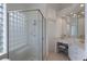 Bathroom with glass shower, built-in seat and large window at 6726 Virginia Xing, University Park, FL 34201