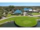 Clubhouse with patio and golf course views at 6726 Virginia Xing, University Park, FL 34201