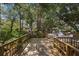 Relaxing outdoor deck with string lights and seating areas at 6726 Virginia Xing, University Park, FL 34201