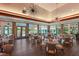 Spacious dining room with large windows and modern lighting at 6726 Virginia Xing, University Park, FL 34201