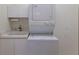 Stackable washer and dryer in a convenient laundry room at 6726 Virginia Xing, University Park, FL 34201