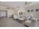 Living area with high ceilings, lots of natural light, and an open floor plan at 6726 Virginia Xing, University Park, FL 34201