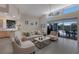 Open living space with neutral decor and access to pool area at 6726 Virginia Xing, University Park, FL 34201
