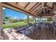 Relaxing lounge area with comfortable seating and golf course views at 6726 Virginia Xing, University Park, FL 34201