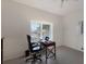 Home office with window, desk and chair at 6726 Virginia Xing, University Park, FL 34201