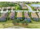 Aerial view of luxury homes with pools and golf course at 6933 Quiet Creek Dr, Bradenton, FL 34212