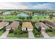 Aerial view of luxury homes with pools and golf course at 6933 Quiet Creek Dr, Bradenton, FL 34212