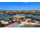 Community tennis courts with clubhouse and landscaping at 6933 Quiet Creek Dr, Bradenton, FL 34212