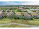 Community overview showcasing homes with tile roofs and pools at 6933 Quiet Creek Dr, Bradenton, FL 34212