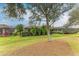 Landscaped backyard with lush greenery and privacy at 6933 Quiet Creek Dr, Bradenton, FL 34212