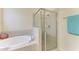 Bathroom boasts a large garden tub and a separate shower stall at 6933 Quiet Creek Dr, Bradenton, FL 34212