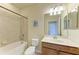 Clean bathroom with a tub and shower at 6933 Quiet Creek Dr, Bradenton, FL 34212